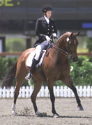 Kebbie Cannon of USA on her mount ''New Idea'' in the Grade IV mixed individual freestyle Dressage during the Sydney 2000 Paralympic Games in Sydney.  Matt Turner / Allsport