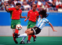 Mario Sosa of Argentina and Alvaro Duraes of Portugal fight for the ball at the Sydney 2000 Paralympics Games.  Adam Pretty/Allsport