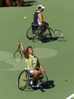 Esther Vergeer and Maaike Smit of the Netherlands in action during the women’s Doubles Final Wheelchair Tennis during the 2000 Paralympic Games. © Nick Wilson/Allsport
